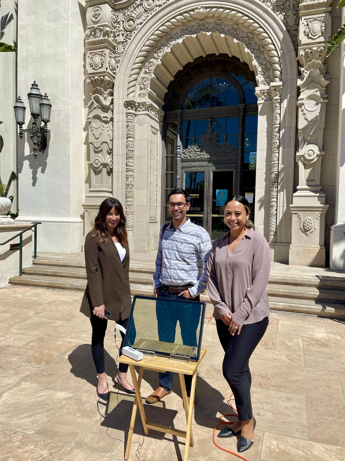 Jessica and two colleagues with a portable View glass demo unit at Beverly Hills City Hall